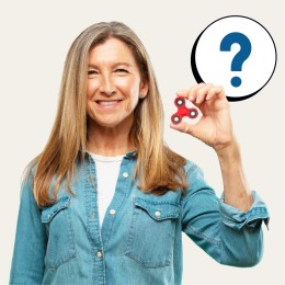 A woman holds a nondescript device. A graphic of a question mark floats in the air next to her.