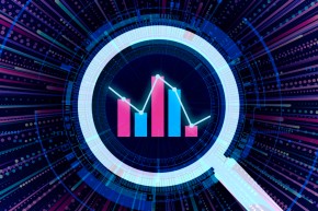 A magnifying glass centered on a bar graph