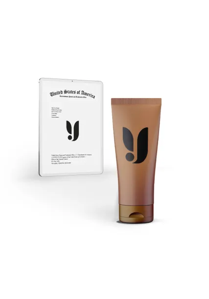 A bottle of cream with a logo printed on the bottle sits in front of a Trademark certificate showing the same logo.